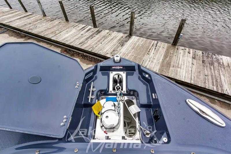 Slide: The Image of 2026 Chaparral SSX 6 boat interior with open storage compartments and sleek seating design. - 39