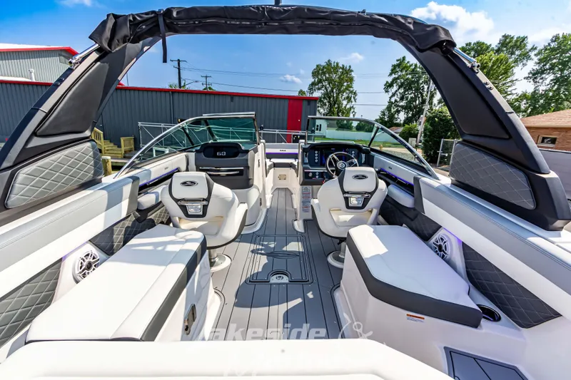 Slide: The Image of 2026 Chaparral SSX 6 boat interior with luxurious seating and modern dashboard. - 9