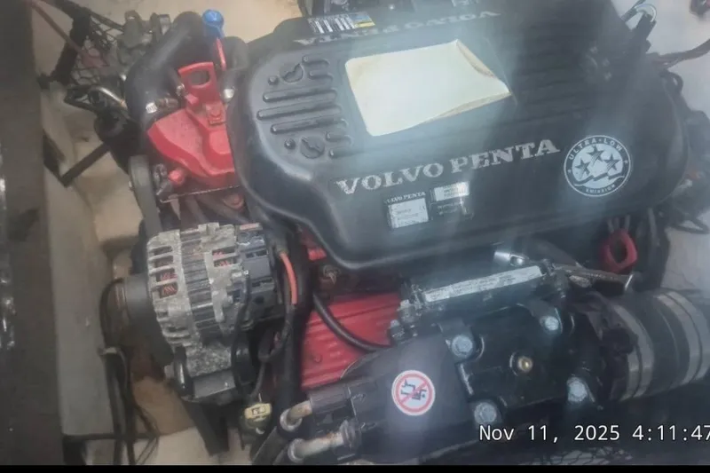Slide: The Image of Volvo Penta engine in a 2008 Larson LXi 268 boat, photographed on November 11, 2025. - 7