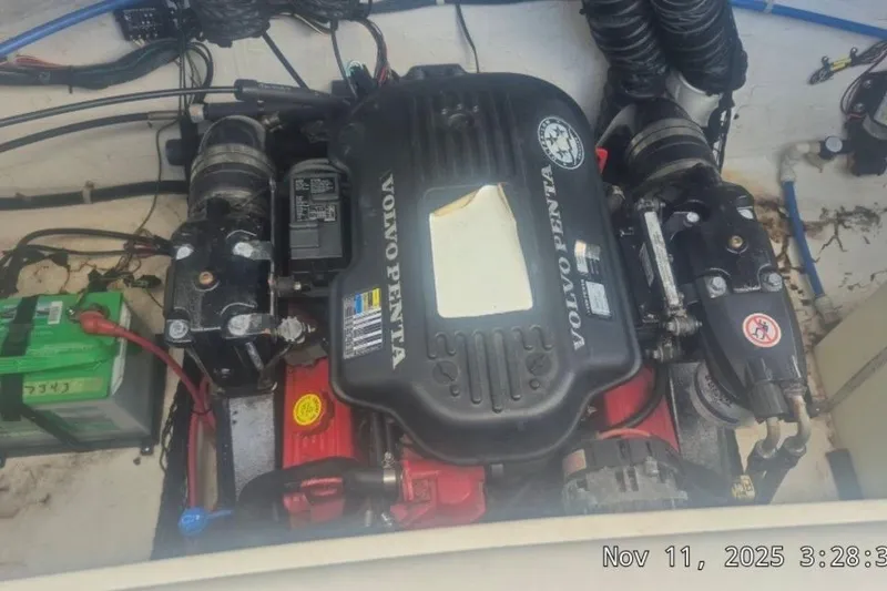 Slide: The Image of 2008 Larson LXi 268 boat engine compartment with Volvo Penta engine. - 9