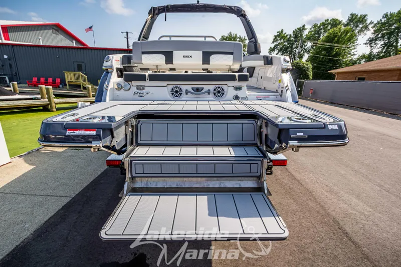 Slide: The Image of 2026 Chaparral SSX 6 boat with extended swim platform and steps at Lakeside Marina. - 15