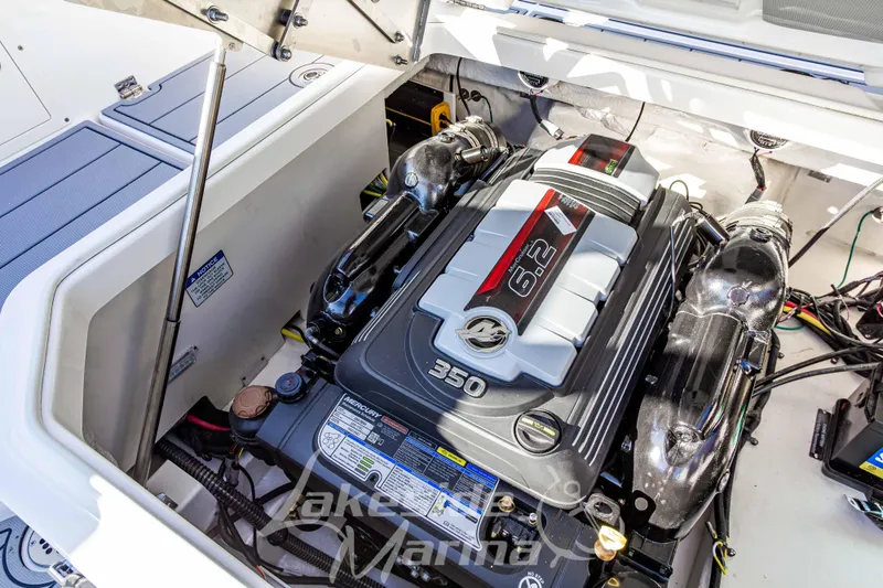 Slide: The Image of 2026 Chaparral SSX 6 boat engine compartment with Mercury 6.2L 350 HP engine. - 19