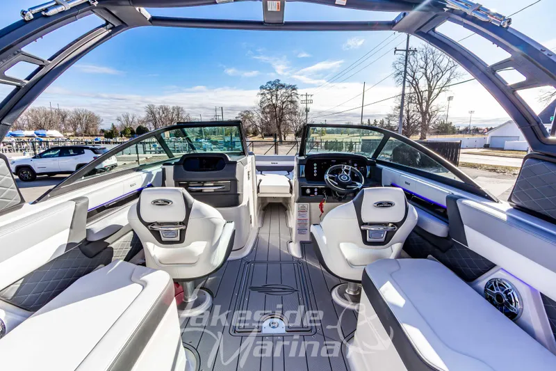 Slide: The Image of Interior view of 2026 Chaparral SSX 6 boat with modern seating and dashboard. - 20