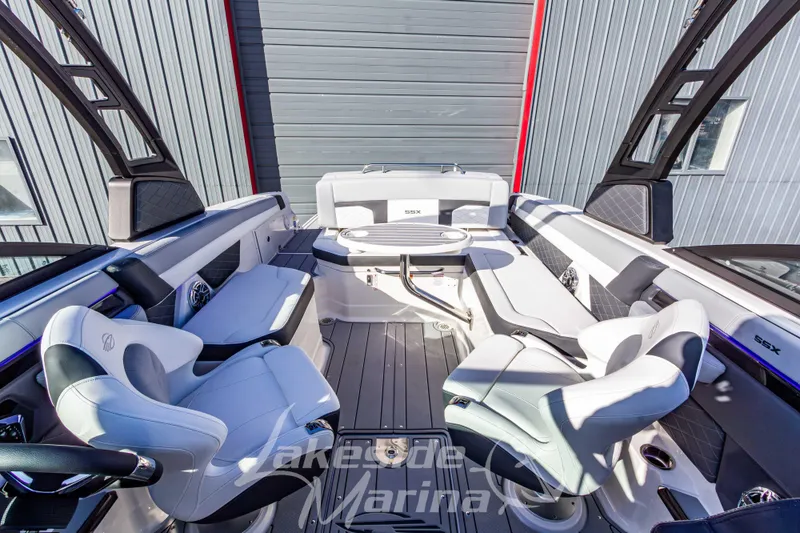 Slide: The Image of 2026 Chaparral SSX 6 boat interior with luxurious seating and modern design. - 32