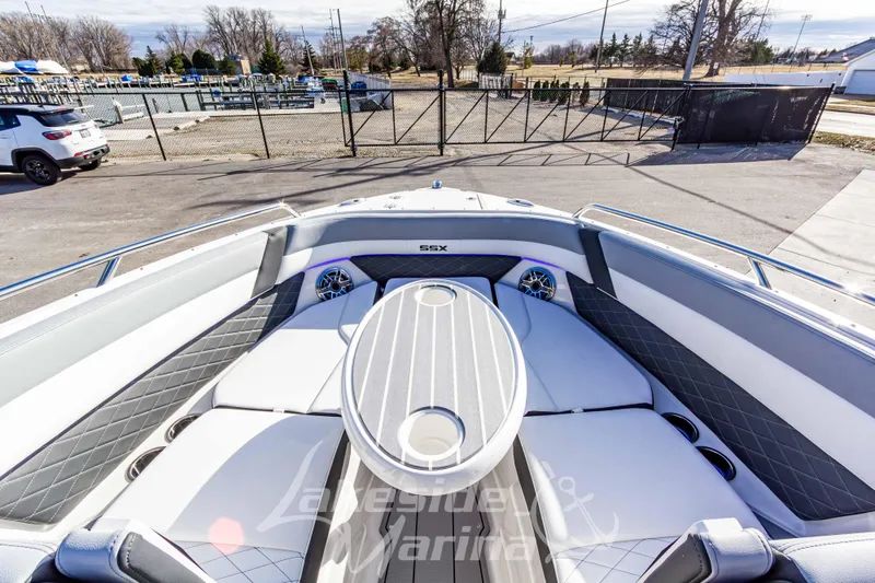 Slide: The Image of 2026 Chaparral SSX 6 boat interior with luxurious seating and modern design. - 36