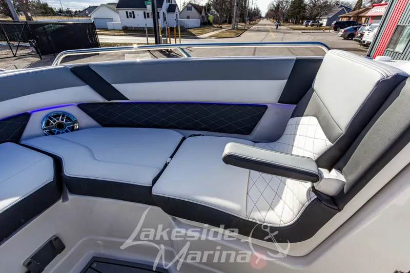 Slide: The Image of 2026 Chaparral SSX 6 boat interior with luxurious seating and speaker system. - 39
