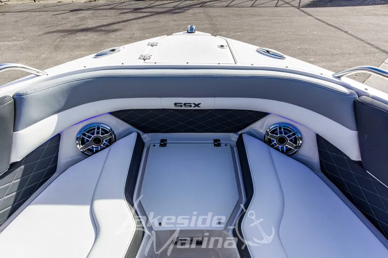 Slide: The Image of 2026 Chaparral SSX 6 boat interior with sleek seating and modern speakers. - 40