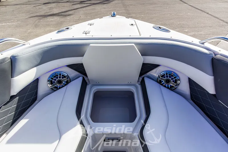 Slide: The Image of Interior of 2026 Chaparral SSX 6 boat with cushioned seating and speakers. - 41