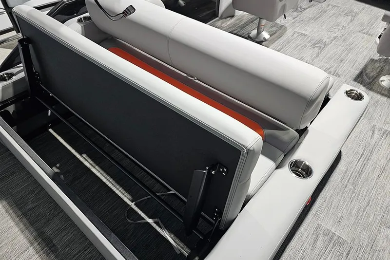 Slide: The Image of 2026 Bentley Pontoons Legacy 243 Swingback interior seating with cup holders and modern design. - 10