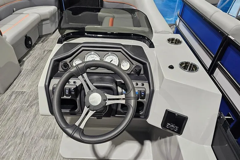 Slide: The Image of 2026 Bentley Pontoons Legacy 243 Swingback dashboard with steering wheel and control panel. - 17