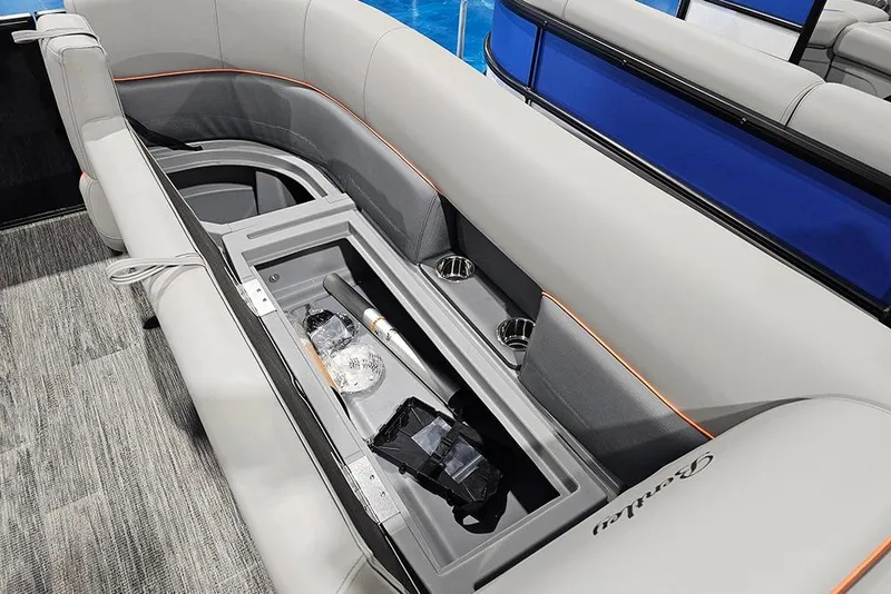 Slide: The Image of 2026 Bentley Pontoons Legacy 243 Swingback interior storage compartment with sleek seating design. - 19