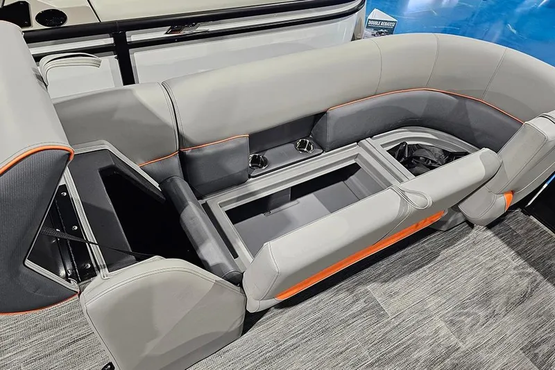 Slide: The Image of 2026 Bentley Pontoons Legacy 243 Swingback interior seating with storage compartments. - 20