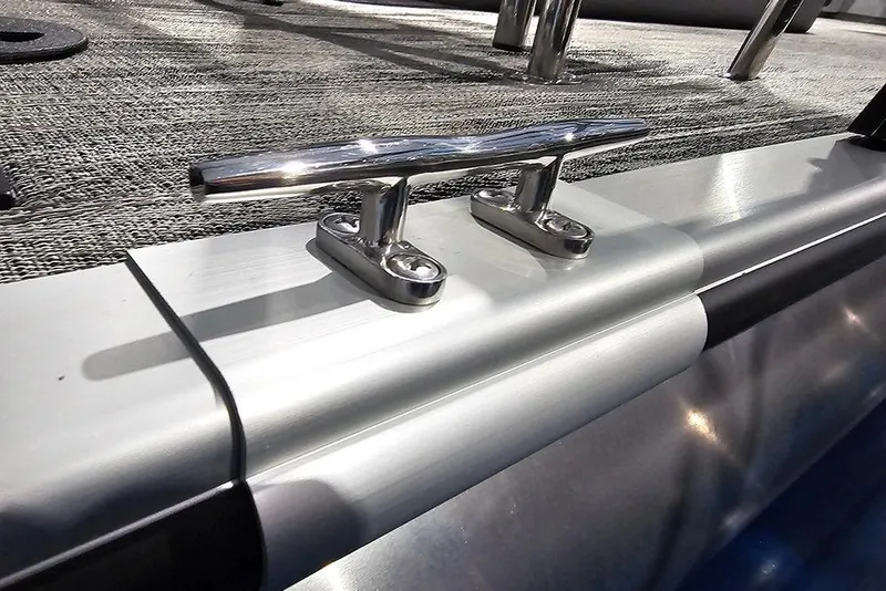 Slide: The Image of 2026 Bentley Pontoons Legacy 243 Swingback boat cleat on deck, close-up view. - 21