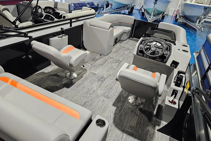 Slide: The Image of 2026 Bentley Pontoons Legacy 243 Swingback interior with modern seating and steering console. - 6