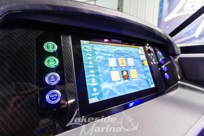 Slide: The Image of Dashboard of 2026 Chaparral SSX 6 with touchscreen and control buttons. - 13