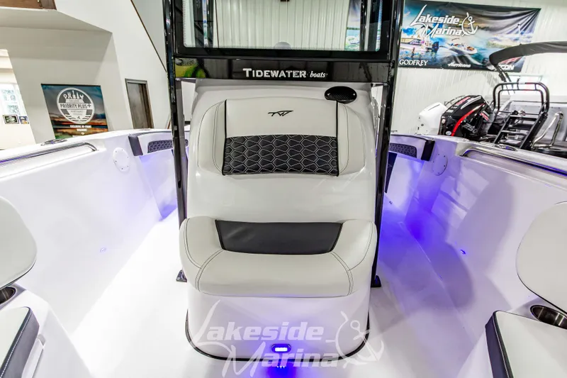 Slide: The Image of 2026 Tidewater 210 CC Adventure boat interior with sleek seating and modern design. - 41