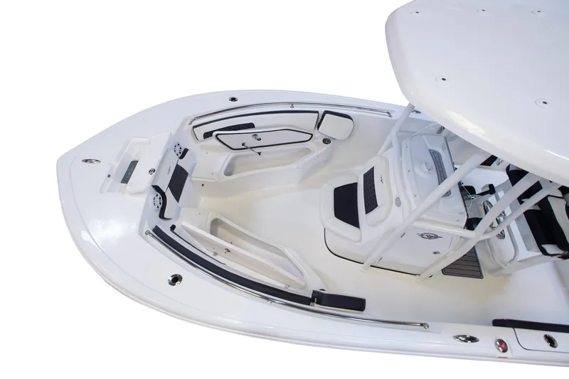 Slide: The Image of 2026 Tidewater 220 LXF boat interior with seating and console, showcasing modern design. - 14