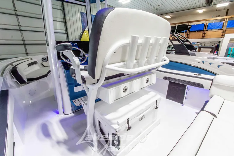 Slide: The Image of 2026 Tidewater 220 LXF boat interior with seating and storage, featuring modern design elements. - 20