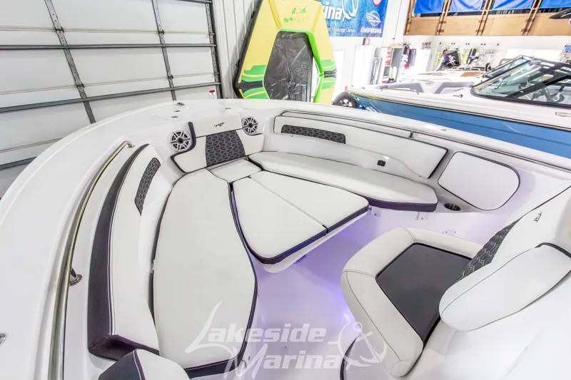 Slide: The Image of 2026 Tidewater 220 LXF boat interior with white seating and modern design at Lakeside Marina. - 43