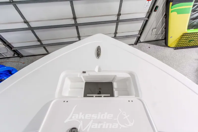 Slide: The Image of 2026 Tidewater 220 LXF boat bow in a garage at Lakeside Marina. - 51