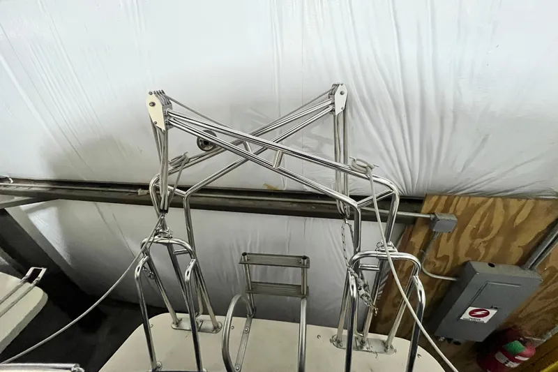 Slide: The Image of Stainless steel framework on a 1999 Nordic Tug 32 boat, stored indoors. - 7