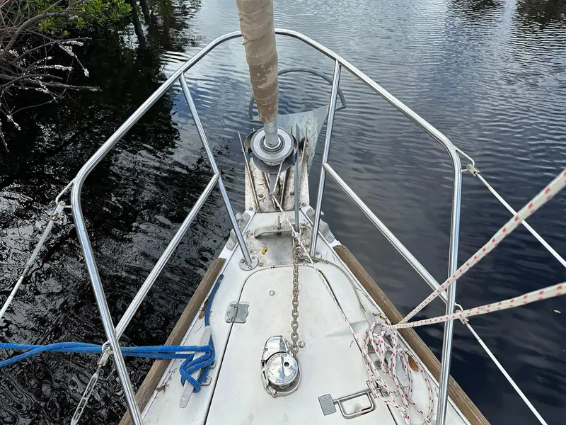 Slide: The Image of Bow of a 1987 Pearson 36-2 sailboat with anchor chain and railing. - 19