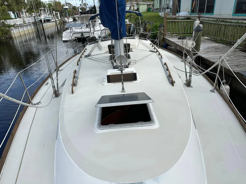 Slide: The Image of 1987 Pearson 36-2 sailboat deck view, docked in a marina. - 21