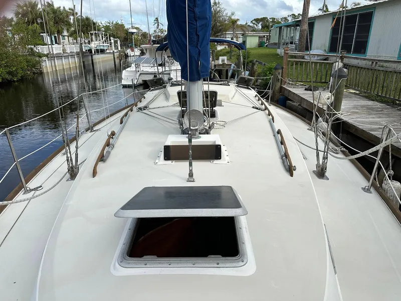 Slide: The Image of 1987 Pearson 36-2 sailboat deck view, docked in a marina. - 22