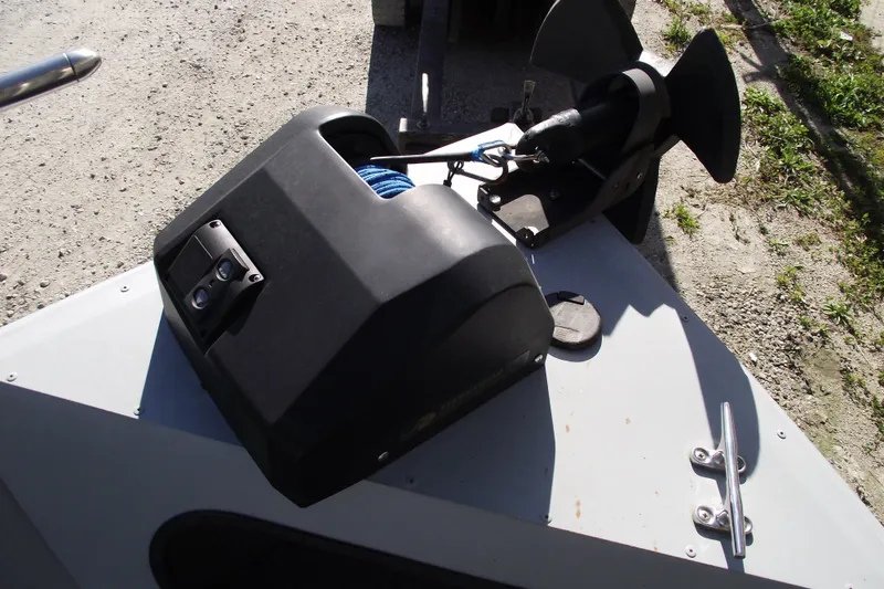 Slide: The Image of 2012 Smoker Craft Pro Angler XL 162 boat with anchor winch on deck. - 13