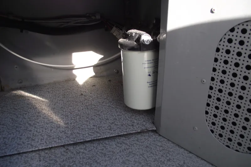 Slide: The Image of 2012 Smoker Craft Pro Angler XL 162 interior with filter and wiring. - 17