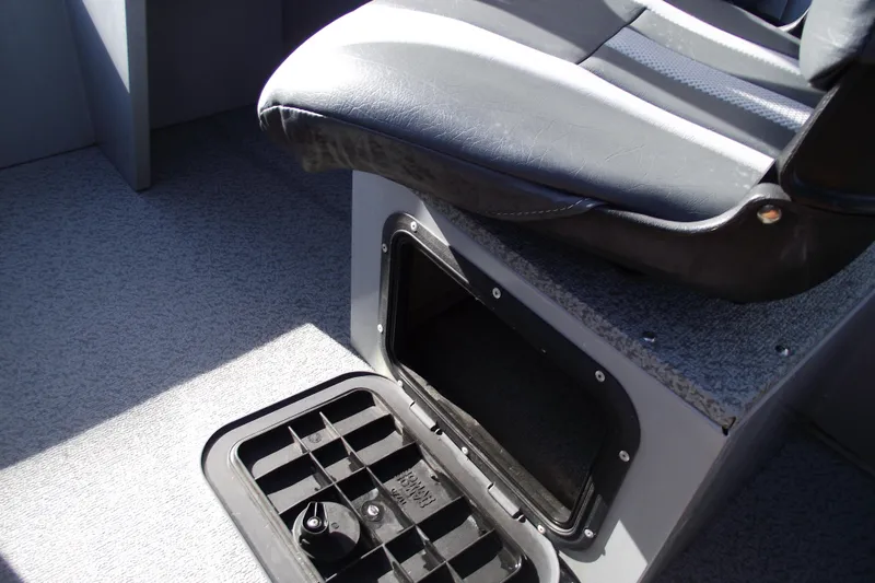 Slide: The Image of 2012 Smoker Craft Pro Angler XL 162 boat seat with storage compartment. - 19