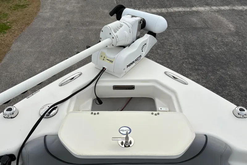 Slide: The Image of Bow of 2022 NauticStar 2302 Legacy with Minn Kota trolling motor. - 34