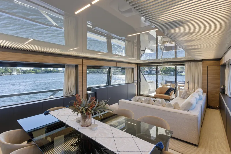 Slide: The Image of Luxurious interior of 2018 Ferretti Yachts 920 with modern decor and scenic window view. - 30