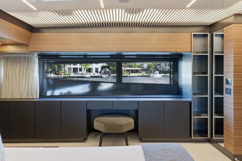 Slide: The Image of Modern interior of 2018 Ferretti Yachts 920 with sleek wood paneling and lighting. - 46