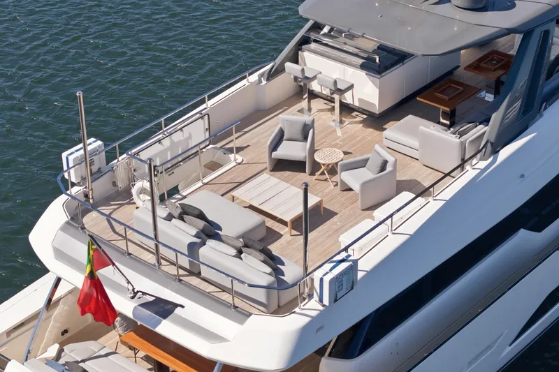 Slide: The Image of 2018 Ferretti Yachts 920 luxury yacht on a sunny day, featuring sleek design and spacious deck. - 7