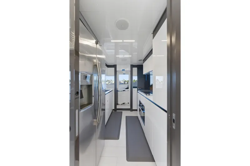 Slide: The Image of Modern kitchen interior on 2018 Ferretti Yachts 920, featuring sleek appliances and minimalist design. - 78