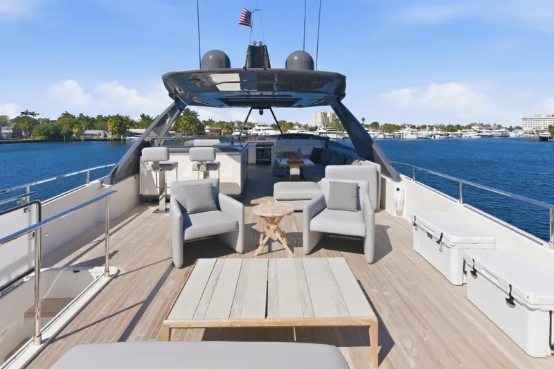 Slide: The Image of Luxury deck seating on 2018 Ferretti Yachts 920, featuring modern outdoor furniture. - 10