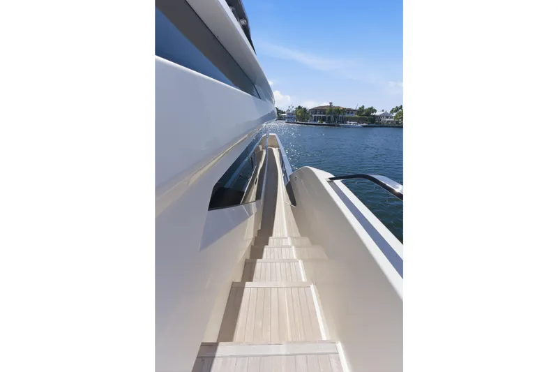 Slide: The Image of Luxurious 2018 Ferretti Yachts 920 deck with elegant seating and dining area. - 19