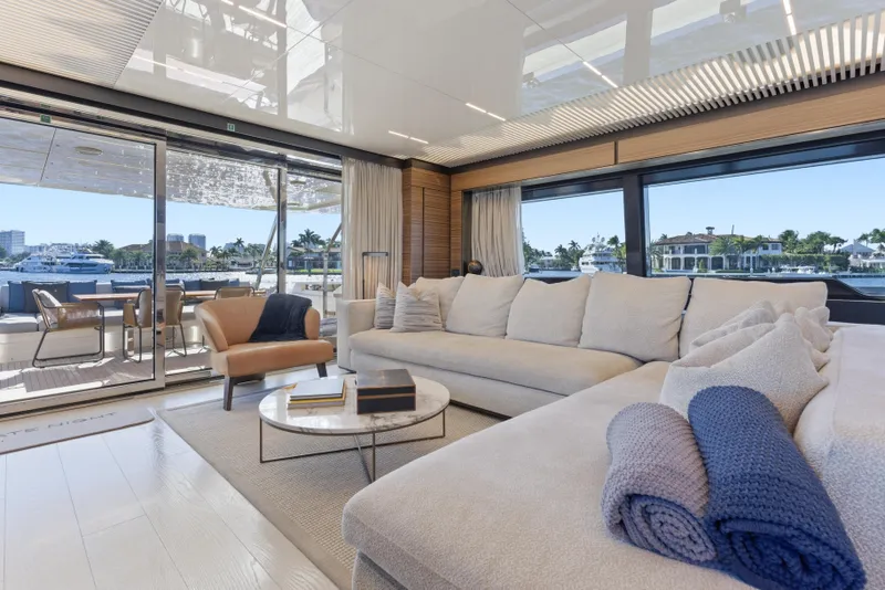 Slide: The Image of Luxurious interior of 2018 Ferretti Yachts 920 with elegant seating and waterfront view. - 28