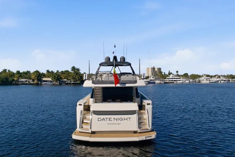 Slide: The Image of Ferretti Yachts 920, 2018 model, docked in a serene marina setting. - 3