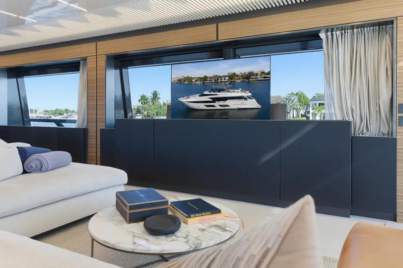 Slide: The Image of Luxurious interior of 2018 Ferretti Yachts 920 with elegant dining area and waterfront view. - 31