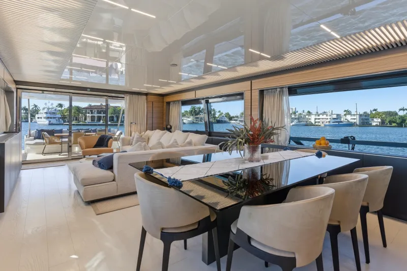 Slide: The Image of Luxurious interior of 2018 Ferretti Yachts 920 with elegant seating and panoramic water views. - 32