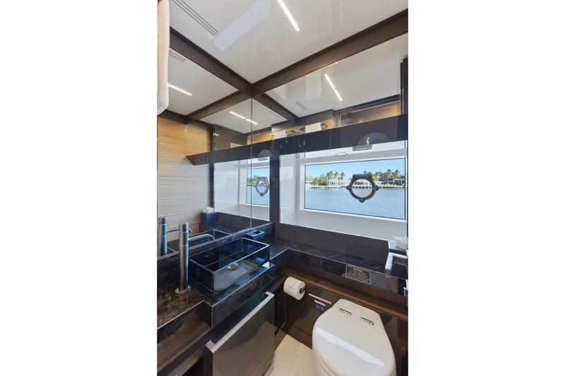 Slide: The Image of Luxurious bedroom interior of 2018 Ferretti Yachts 920 with modern design and elegant furnishings. - 39