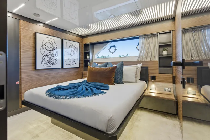 Slide: The Image of Luxurious bedroom interior of 2018 Ferretti Yachts 920 with elegant decor and ocean view. - 59