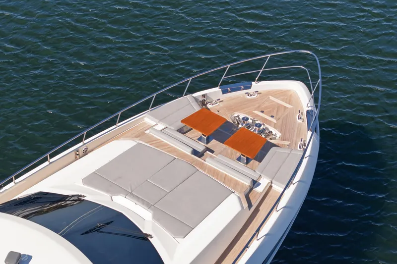 Slide: The Image of Luxurious 2018 Ferretti Yachts 920 deck with elegant seating and ocean view. - 6