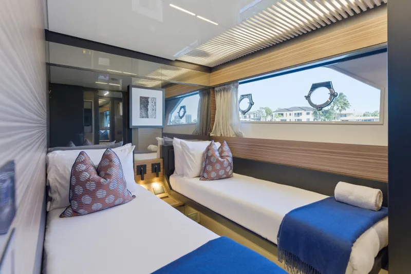 Slide: The Image of Luxurious twin cabin interior on 2018 Ferretti Yachts 920, featuring modern design and ocean view. - 64