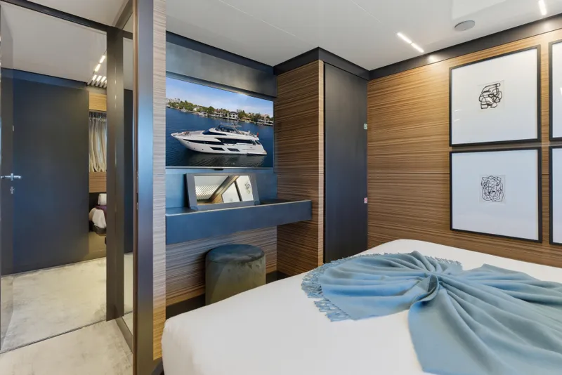 Slide: The Image of Luxurious bedroom interior of 2018 Ferretti Yachts 920 with elegant decor and large window. - 71