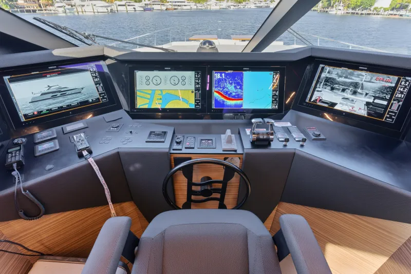 Slide: The Image of Cockpit of 2018 Ferretti Yachts 920 with advanced navigation systems and modern design. - 76