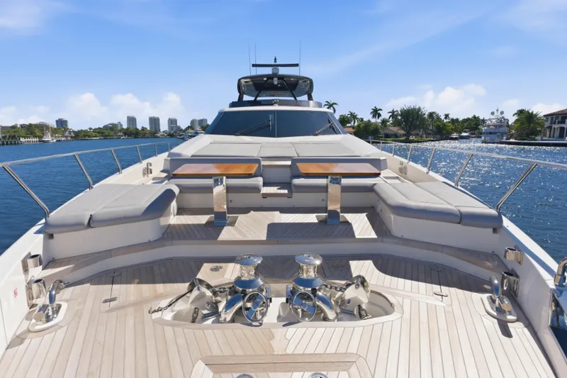Slide: The Image of Luxurious 2018 Ferretti Yachts 920 deck with elegant seating and scenic waterfront views. - 9