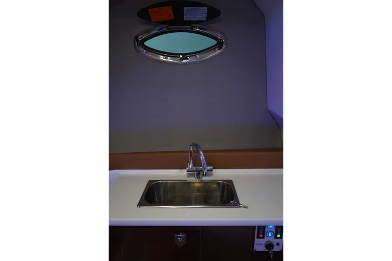 Slide: The Image of Luxurious seating on 2026 Chaparral 310 OSX boat, featuring modern design and premium materials. - 8